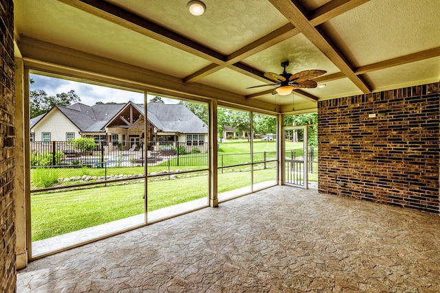 104 Drexal Dr, Huntsville, TX 77340 - unfurnished sunroom with ceiling fan, beamed ceiling, a residential view, and coffered ceiling