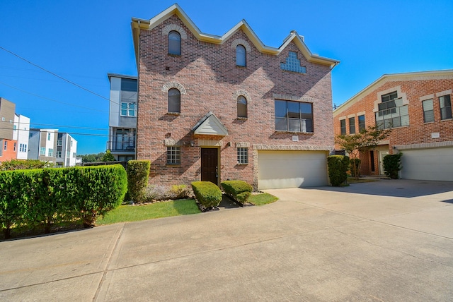 9703 Riddlewood Ln, Houston, TX 77025 - view of front of property with brick siding, driveway, and a garage