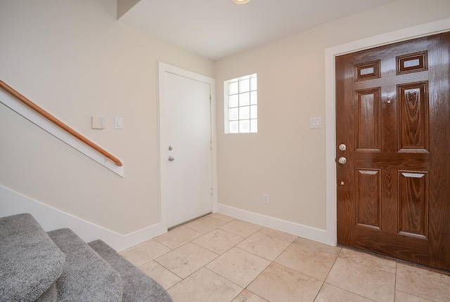 9703 Riddlewood Ln, Houston, TX 77025 - foyer entrance with stairs and light tile patterned floors