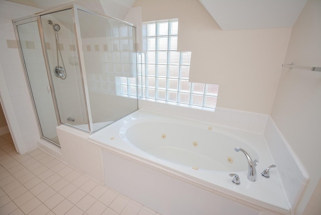 9703 Riddlewood Ln, Houston, TX 77025 - full bath featuring a shower stall, a tub with jets, and tile patterned flooring