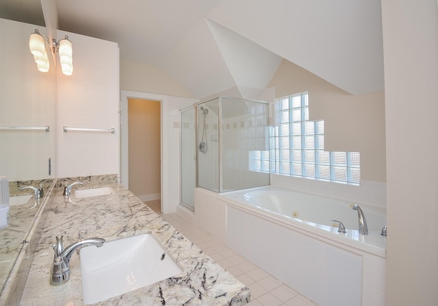 9703 Riddlewood Ln, Houston, TX 77025 - full bathroom with a stall shower, a jetted tub, double vanity, lofted ceiling, and tile patterned floors