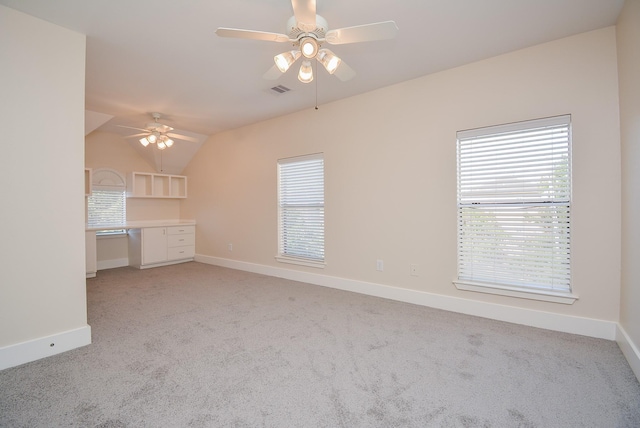 9703 Riddlewood Ln, Houston, TX 77025 - unfurnished living room featuring ceiling fan, light carpet, and lofted ceiling