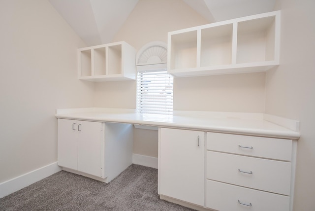 9703 Riddlewood Ln, Houston, TX 77025 - unfurnished office featuring light carpet and built in desk