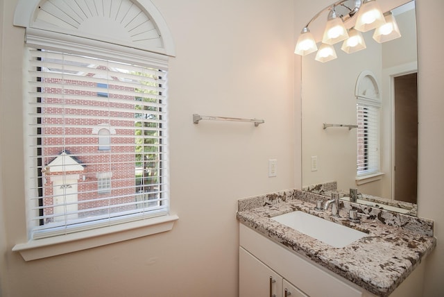 9703 Riddlewood Ln, Houston, TX 77025 - bathroom with vanity and a chandelier