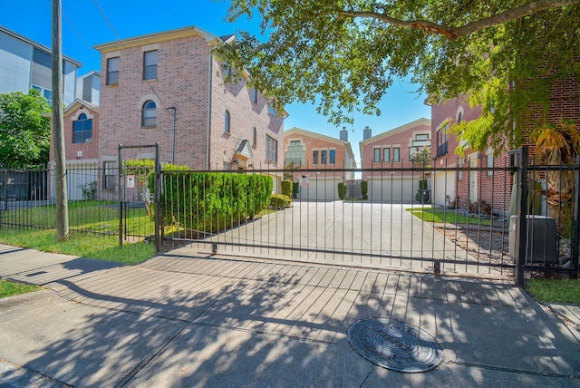 9703 Riddlewood Ln, Houston, TX 77025 - gate featuring a residential view