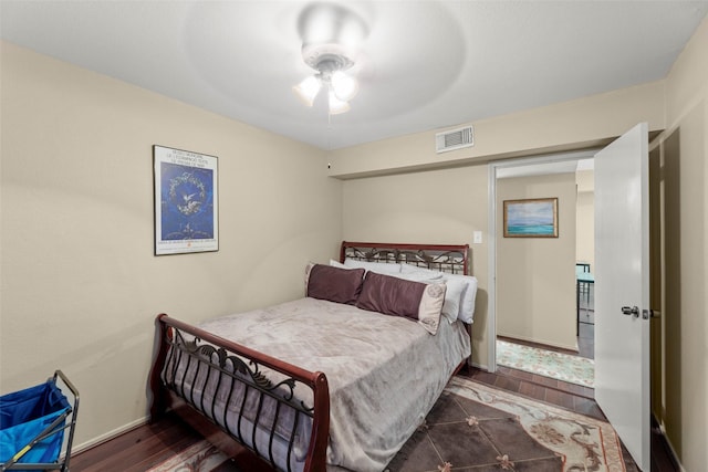 4643 Wild Indigo St Unit 416, Houston, TX 77027 - bedroom with wood finished floors and a ceiling fan