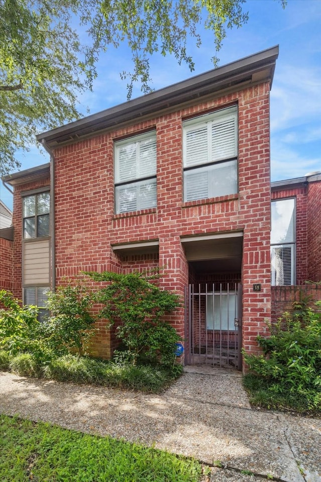7447 Cambridge St Unit 15, Houston, TX 77054 - view of front of property featuring brick siding