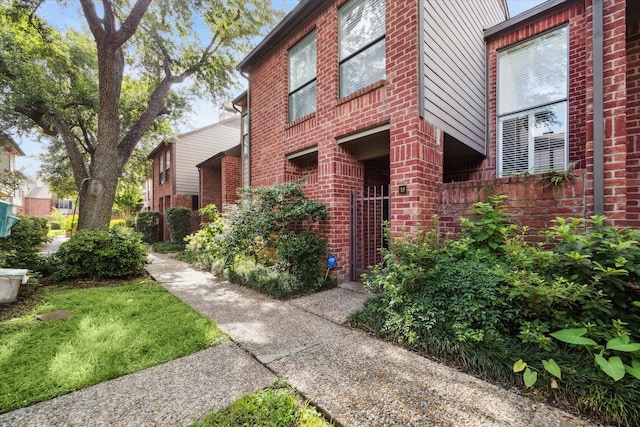 7447 Cambridge St Unit 15, Houston, TX 77054 - entrance to property with brick siding