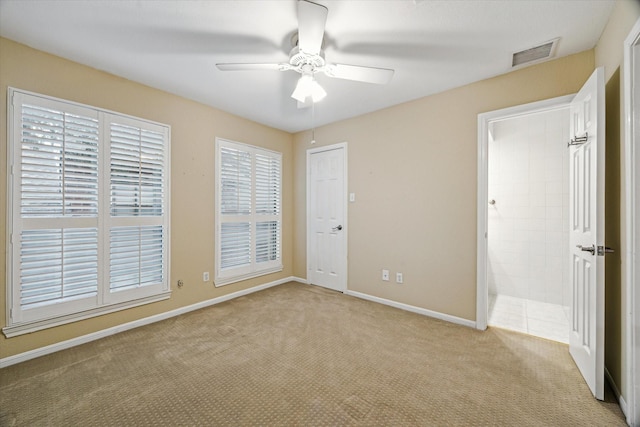 7447 Cambridge St Unit 15, Houston, TX 77054 - unfurnished room with a ceiling fan and light carpet