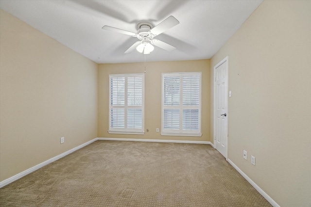 7447 Cambridge St Unit 15, Houston, TX 77054 - carpeted empty room featuring ceiling fan and baseboards