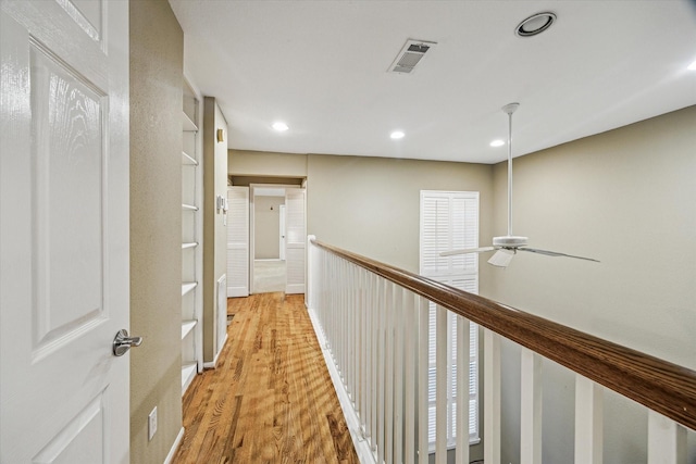 7447 Cambridge St Unit 15, Houston, TX 77054 - hall with light wood-type flooring and recessed lighting