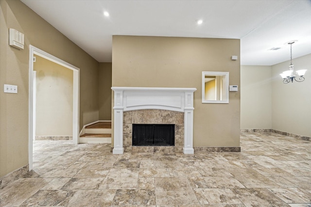 7447 Cambridge St Unit 15, Houston, TX 77054 - unfurnished living room with a tile fireplace, a chandelier, and stone finish floors