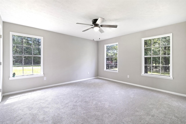 387 Hackberry Dr, Onalaska, TX 77360 - spare room with carpet floors and ceiling fan