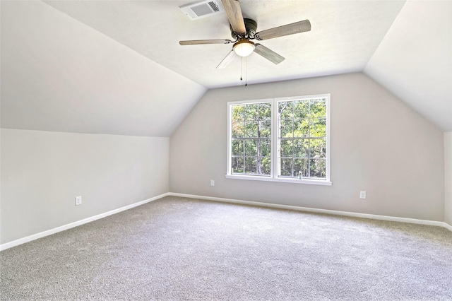 387 Hackberry Dr, Onalaska, TX 77360 - additional living space with vaulted ceiling, carpet, and a ceiling fan