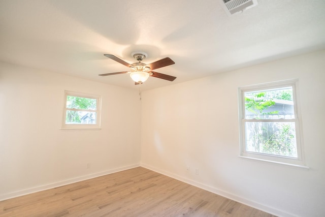 1025 Hathaway Ln, Marque, TX 77568 - unfurnished room with plenty of natural light, light wood finished floors, and a ceiling fan