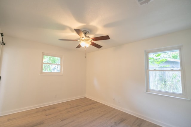 1025 Hathaway Ln, Marque, TX 77568 - unfurnished room with light wood finished floors and ceiling fan