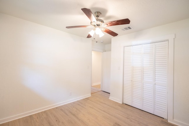 1025 Hathaway Ln, Marque, TX 77568 - unfurnished bedroom featuring light wood-type flooring, a closet, and ceiling fan