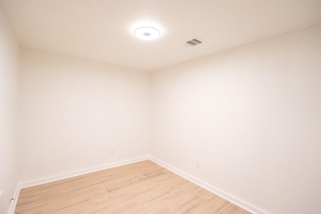 1025 Hathaway Ln, Marque, TX 77568 - empty room with light wood finished floors and baseboards