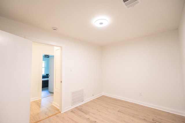1025 Hathaway Ln, Marque, TX 77568 - spare room featuring light wood-style flooring and baseboards