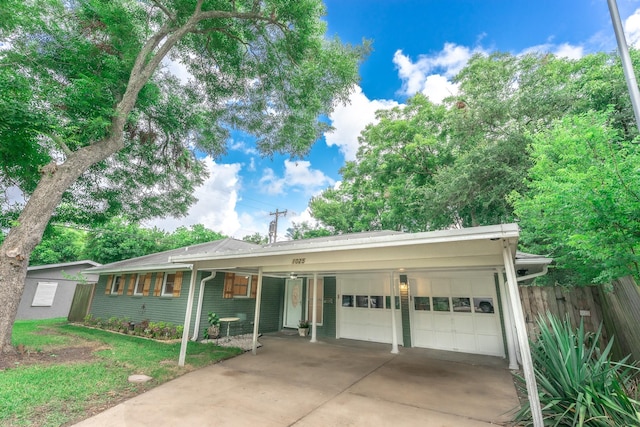 1025 Hathaway Ln, Marque, TX 77568 - ranch-style home featuring an attached garage