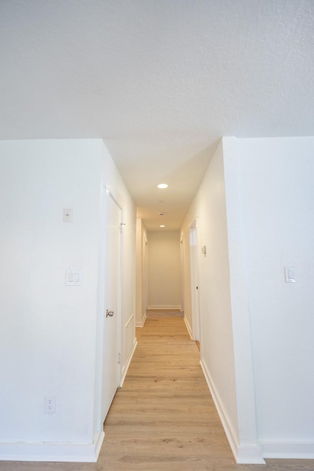 1025 Hathaway Ln, Marque, TX 77568 - hall with light wood-style floors and recessed lighting