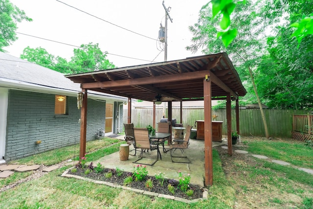 1025 Hathaway Ln, Marque, TX 77568 - fenced backyard featuring a patio area