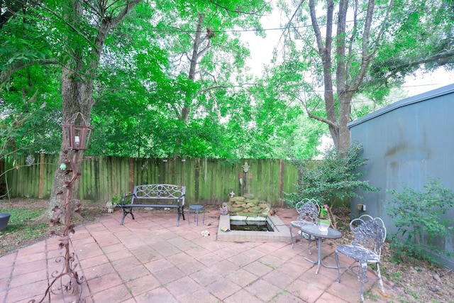 1025 Hathaway Ln, Marque, TX 77568 - fenced backyard featuring a patio