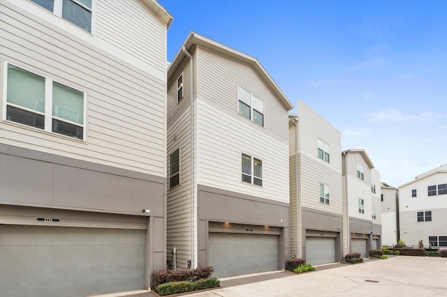 2753 Clinton Dr, Houston, TX 77020 - view of home's exterior with a garage