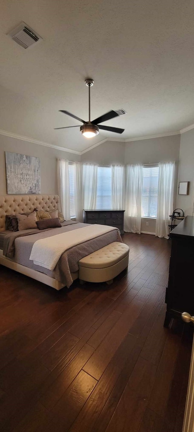 7922 Scenic Canyon Ln W, Houston, TX 77095 - bedroom featuring ornamental molding, dark wood-type flooring, and a ceiling fan