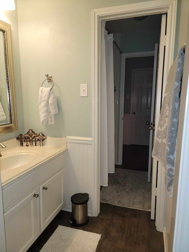 7922 Scenic Canyon Ln W, Houston, TX 77095 - full bath featuring vanity, wainscoting, and wood finished floors