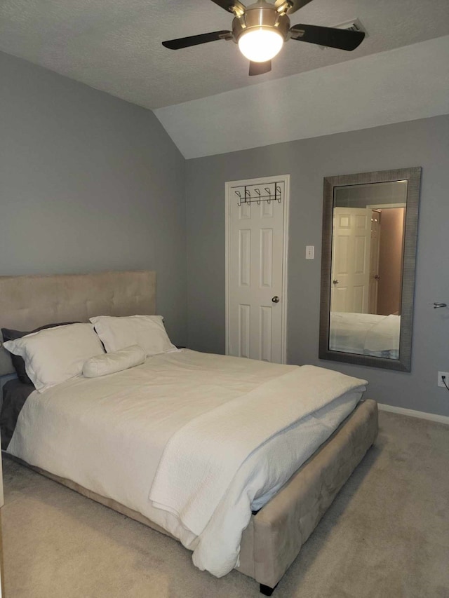 7922 Scenic Canyon Ln W, Houston, TX 77095 - carpeted bedroom featuring lofted ceiling and a ceiling fan