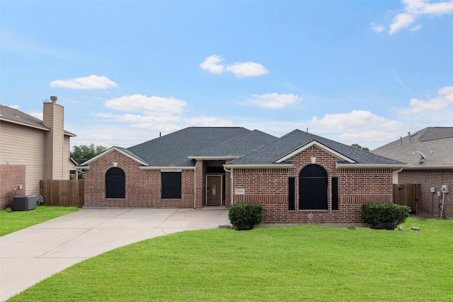 23826 Spring Dane Dr, Spring, TX 77373 - view of front of home featuring brick siding, roof with shingles, and concrete driveway