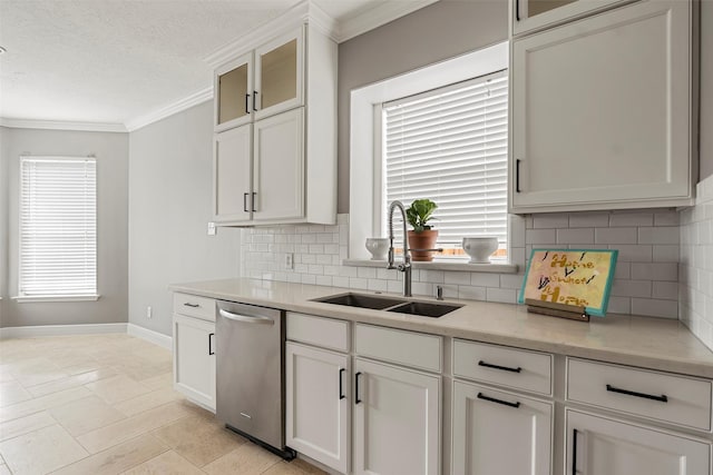 23826 Spring Dane Dr, Spring, TX 77373 - kitchen featuring dishwasher, ornamental molding, tasteful backsplash, white cabinetry, and glass insert cabinets