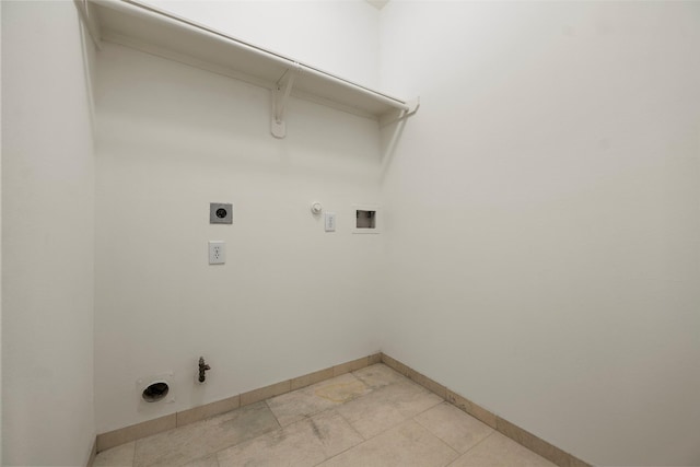 23826 Spring Dane Dr, Spring, TX 77373 - laundry area with hookup for a gas dryer, hookup for an electric dryer, hookup for a washing machine, and light tile patterned floors