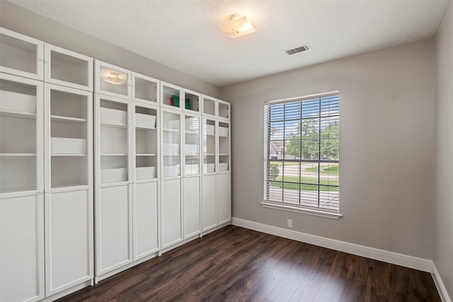 23826 Spring Dane Dr, Spring, TX 77373 - unfurnished room with baseboards and dark wood-style floors