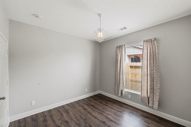 23826 Spring Dane Dr, Spring, TX 77373 - spare room with a chandelier, dark wood finished floors, and a smoke detector