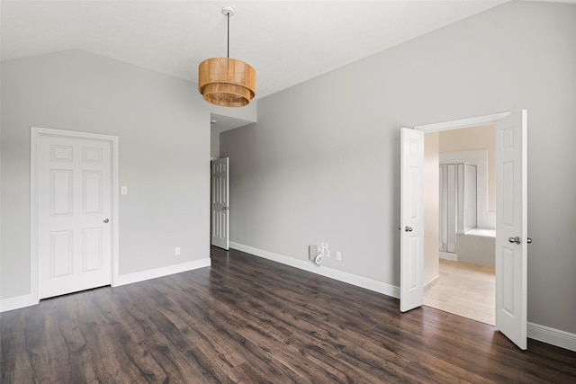 23826 Spring Dane Dr, Spring, TX 77373 - spare room featuring dark wood-style floors and lofted ceiling