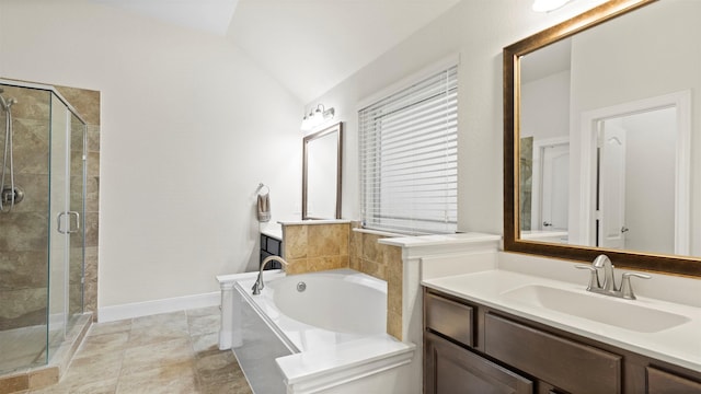 15314 Icet Creek Ave, Mont Belvieu, TX 77523 - bathroom with a stall shower, lofted ceiling, a bath, and vanity