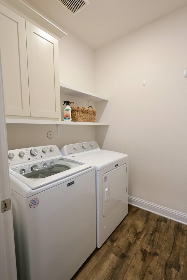 20503 Montecrest Cir, Spring, TX 77379 - laundry area with dark wood-type flooring, independent washer and dryer, and cabinet space