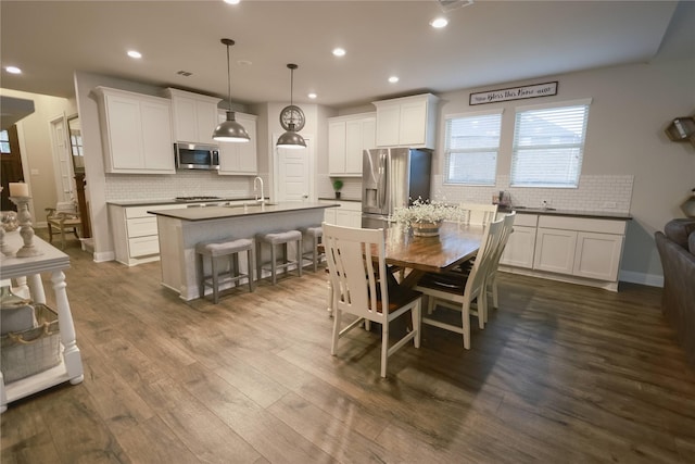 20503 Montecrest Cir, Spring, TX 77379 - dining space with recessed lighting and dark wood finished floors