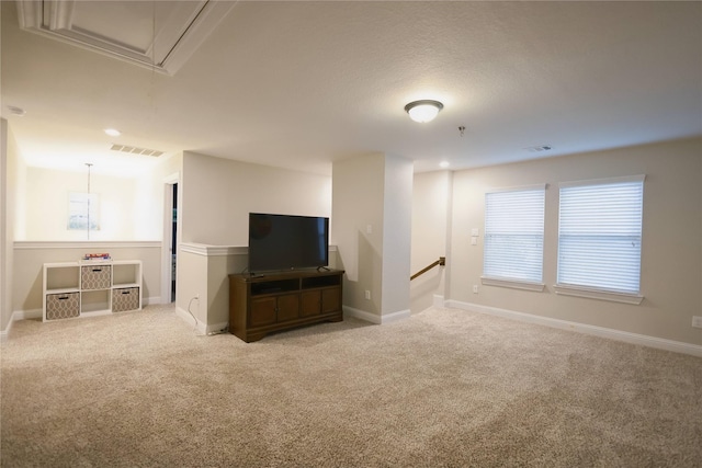 20503 Montecrest Cir, Spring, TX 77379 - unfurnished living room featuring attic access and carpet flooring