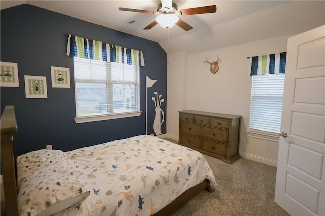 20503 Montecrest Cir, Spring, TX 77379 - carpeted bedroom with multiple windows, lofted ceiling, and a ceiling fan