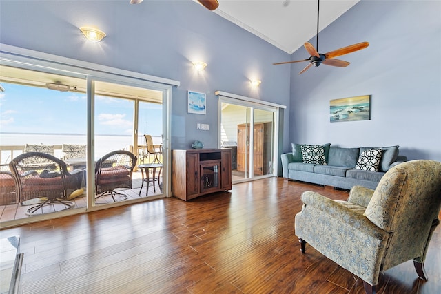 325 Carolcrest Ln Unit 2, Livingston, TX 77351 - living room featuring ceiling fan, wood finished floors, ornamental molding, and high vaulted ceiling