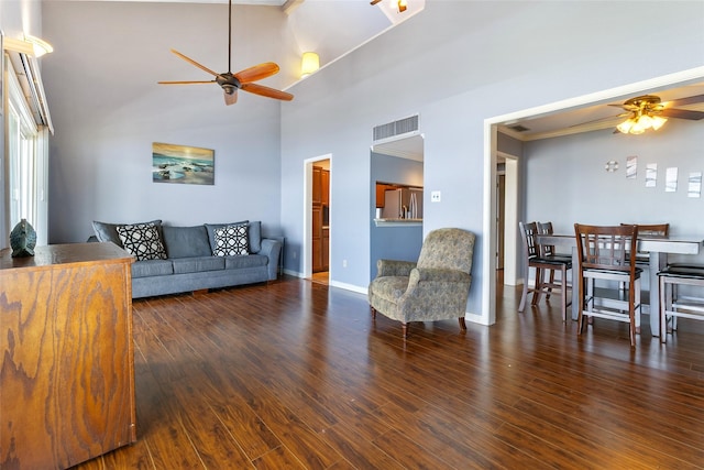 325 Carolcrest Ln Unit 2, Livingston, TX 77351 - living room featuring a ceiling fan, wood finished floors, ornamental molding, and high vaulted ceiling