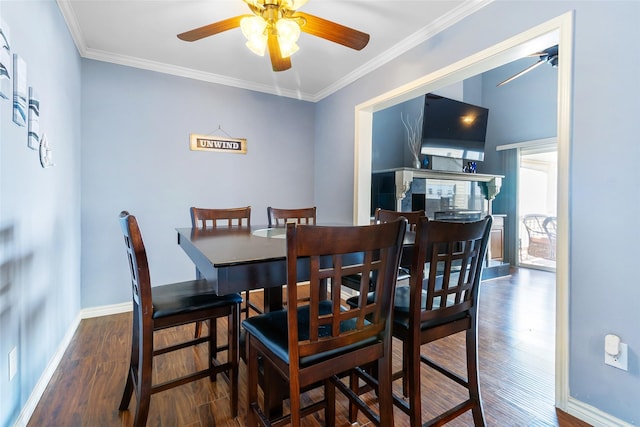 325 Carolcrest Ln Unit 2, Livingston, TX 77351 - dining space with ceiling fan, wood finished floors, and ornamental molding