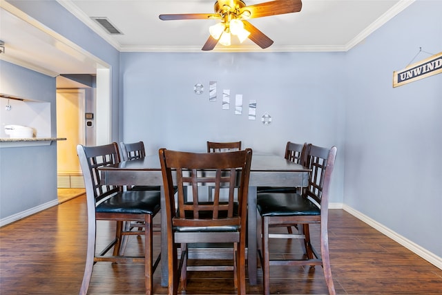 325 Carolcrest Ln Unit 2, Livingston, TX 77351 - dining area with ceiling fan, wood finished floors, and ornamental molding