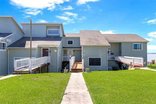 325 Carolcrest Ln Unit 2, Livingston, TX 77351 - view of front facade with a front yard and roof with shingles