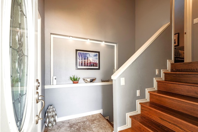 325 Carolcrest Ln Unit 2, Livingston, TX 77351 - entryway featuring stairs and baseboards