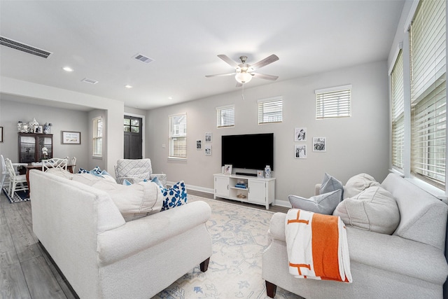 4101 Split Ivy Dr, Houston, TX 77080 - living area with wood finished floors, healthy amount of natural light, ceiling fan, and recessed lighting