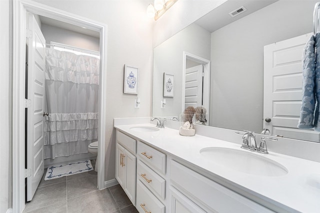 4101 Split Ivy Dr, Houston, TX 77080 - full bathroom featuring double vanity and tile patterned flooring